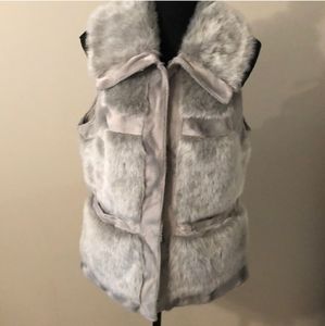 Adorable faux fur gray (silver) vest. Well made!